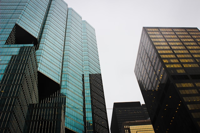 Commercial property skyscrapers against a grey sky